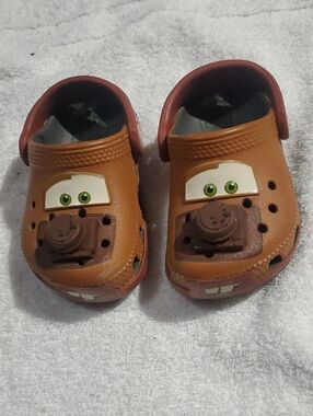CROCS Kids Brown Character Clog Sandals with Green Eyes